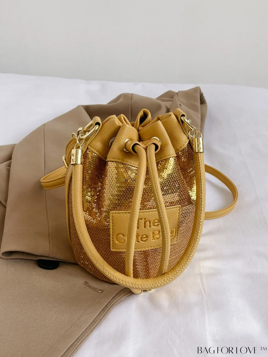 BagForLove - Sequin-Decorated Drawstring Satchel: Fashionable Letter Patch Bucket Bag