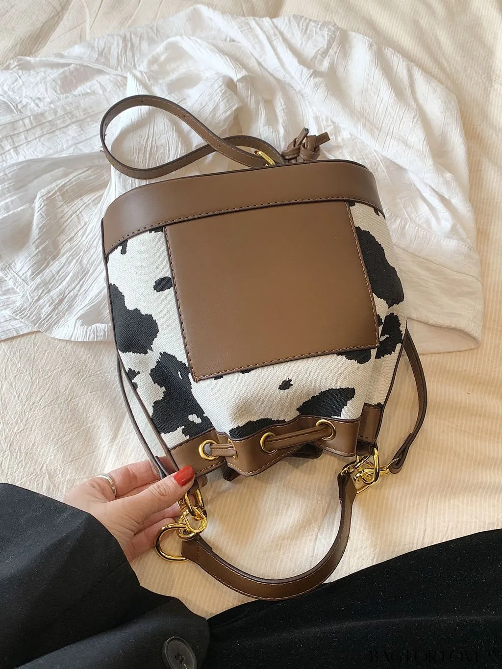 BagForLove - Stylish Cow Pattern Colorblock Bucket Bag with Drawstring - Captivating Design