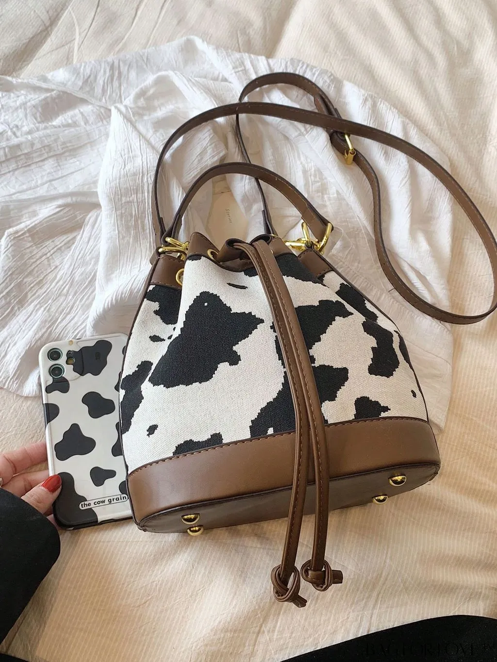 BagForLove - Stylish Cow Pattern Colorblock Bucket Bag with Drawstring - Captivating Design