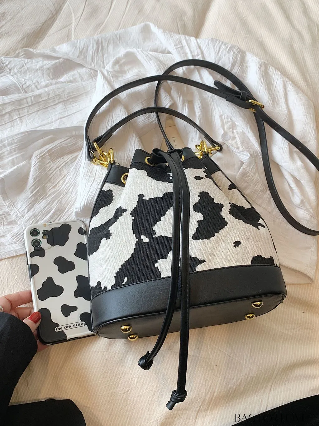 BagForLove - Stylish Cow Pattern Colorblock Bucket Bag with Drawstring - Captivating Design