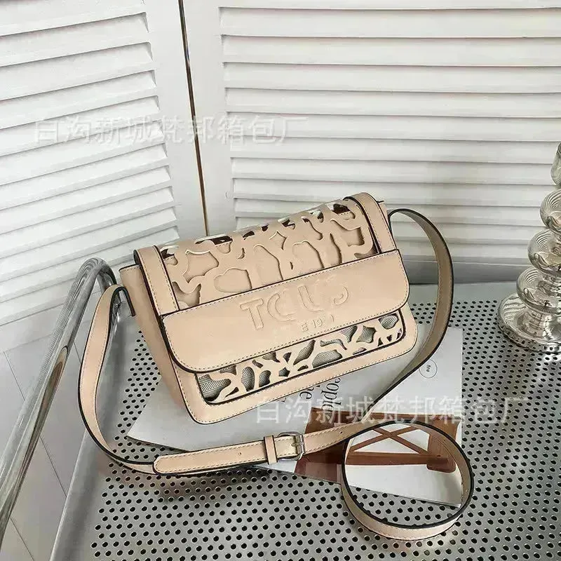 Hollowed-Out Tous Messenger Bag
